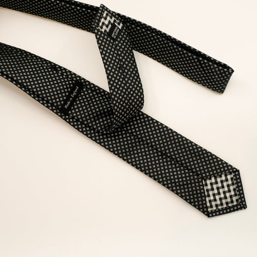 Black patterned tie 