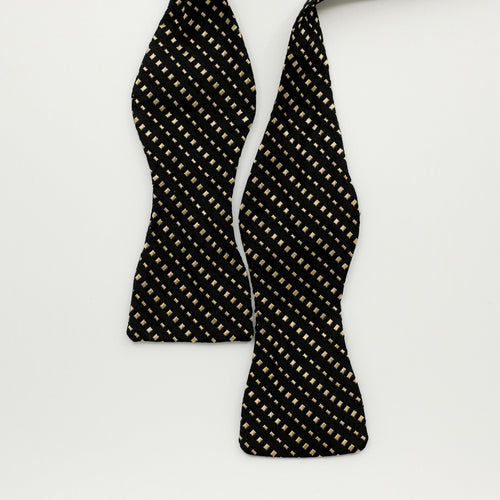 Black bow tie with gold square polka dots 